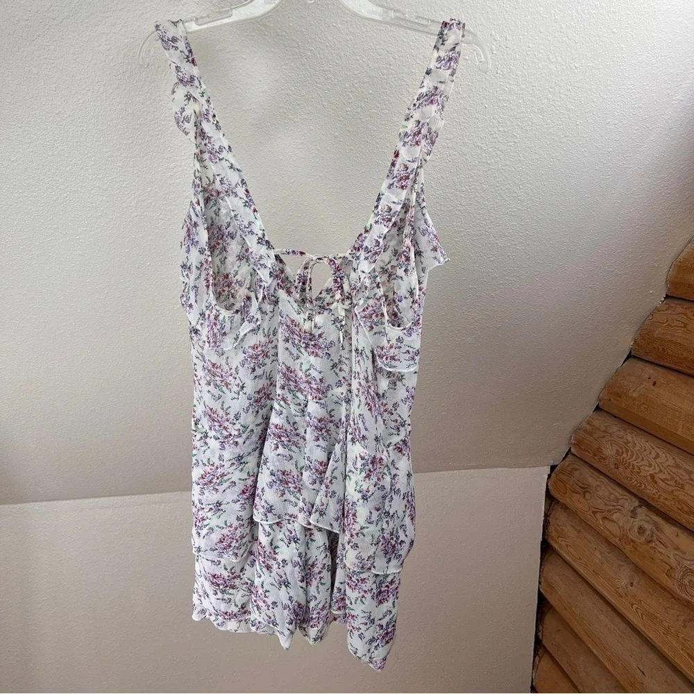 NASTY GAL FLORAL RUFFLE PLAYSUIT. NWT. Ruffle straps end in deep V-neck. Size 10 - Picture 8 of 13